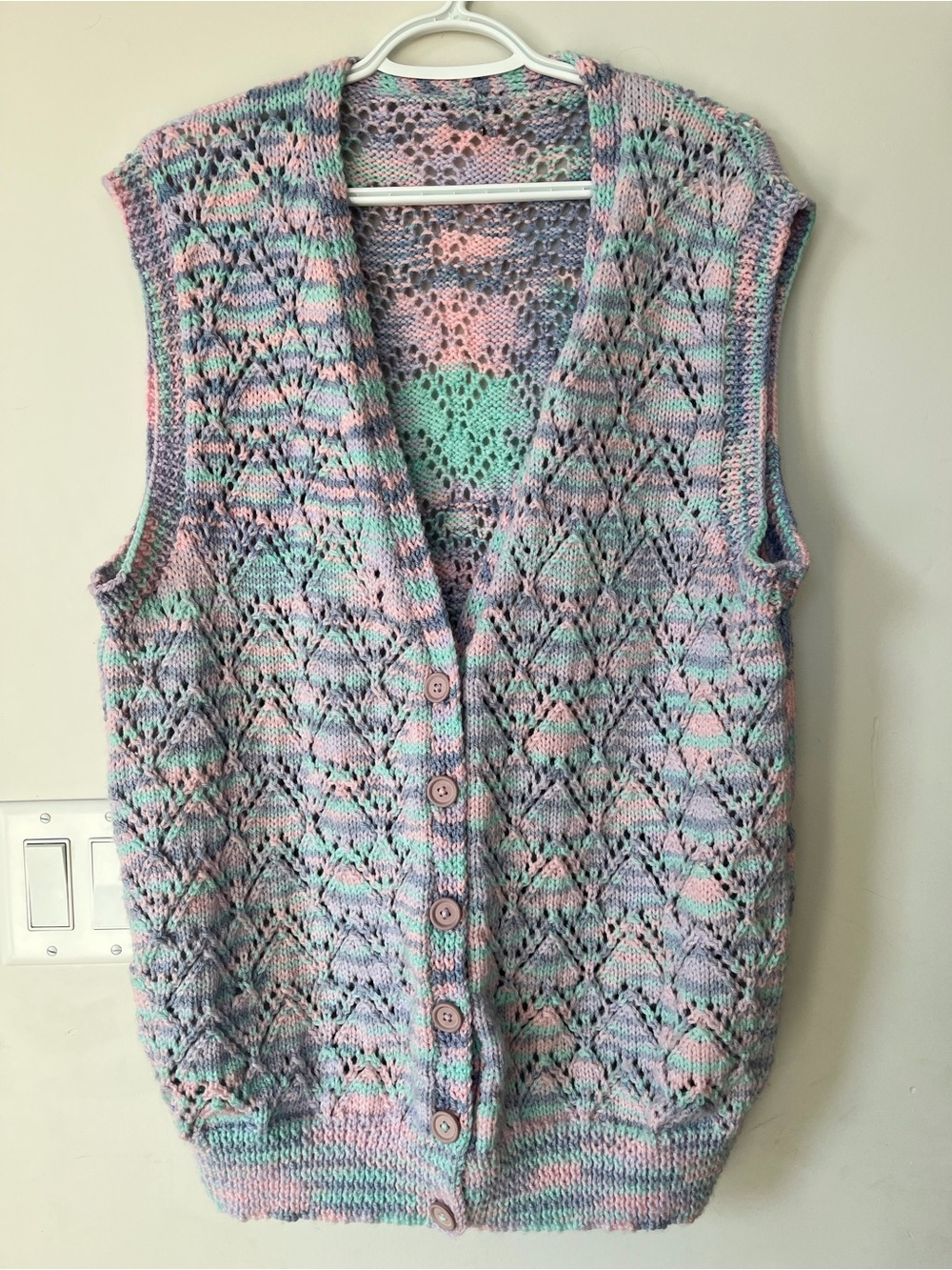 Super cute women’s pastel coloured button up knit vest